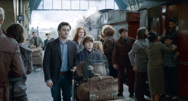 SUNDAY CALENDAR AUGUST 7, 2011. DO NOT USE PRIOR TO PUBLICATION ******************** (L-r from center) DANIEL RADCLIFFE as Harry Potter, BONNIE WRIGHT as Ginny Weasley and ARTHUR BOWEN as Albus Severus Potter (19 years later) in Warner Bros. Pictures' fantasy adventure movie "HARRY POTTER AND THE DEATHLY HALLOWS - PART 2," a Warner Bros. Pictures release. Photo courtesy of Warner Bros. Pictures