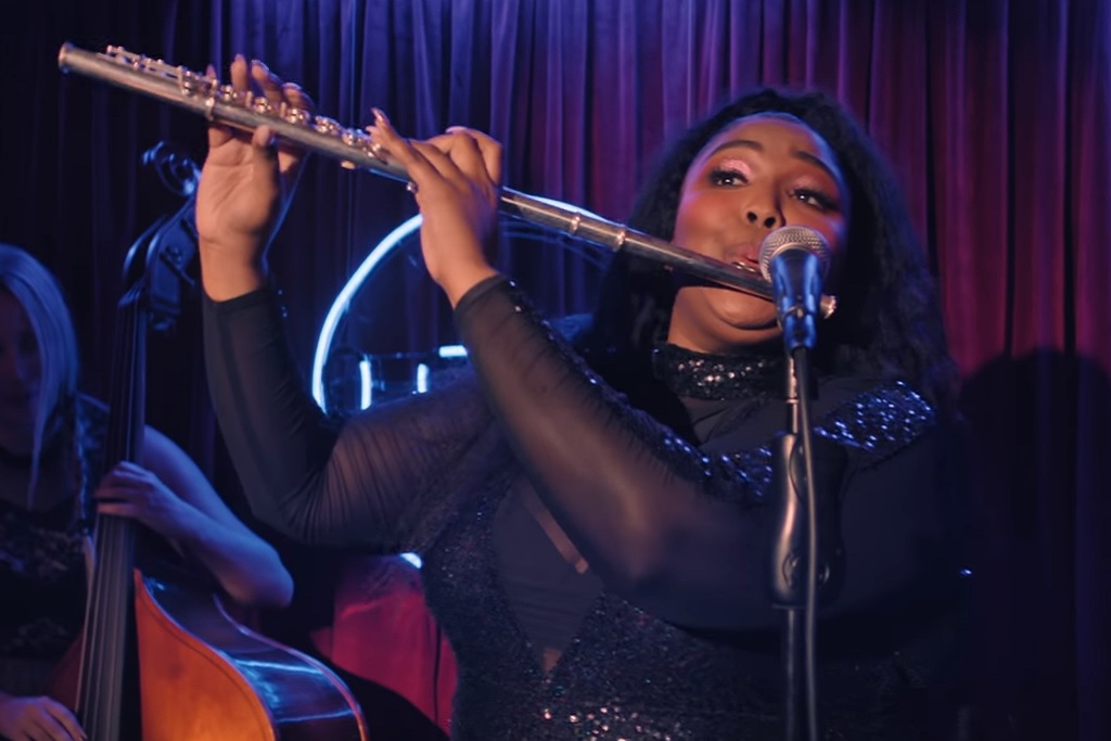 Lizzo, playing the flute in a homage to Anchorman