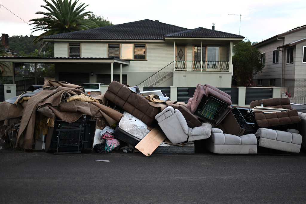 LISMORE, AUSTRALIA - MARCH 02: Discarded furniture outside a flood affected property on March 02, 2022 in Lismore, Australia. Several northern New South Wales towns have been forced to evacuate as Australia faces unprecedented storms and the worst flooding in a decade. (Photo by Dan Peled/Getty Images)