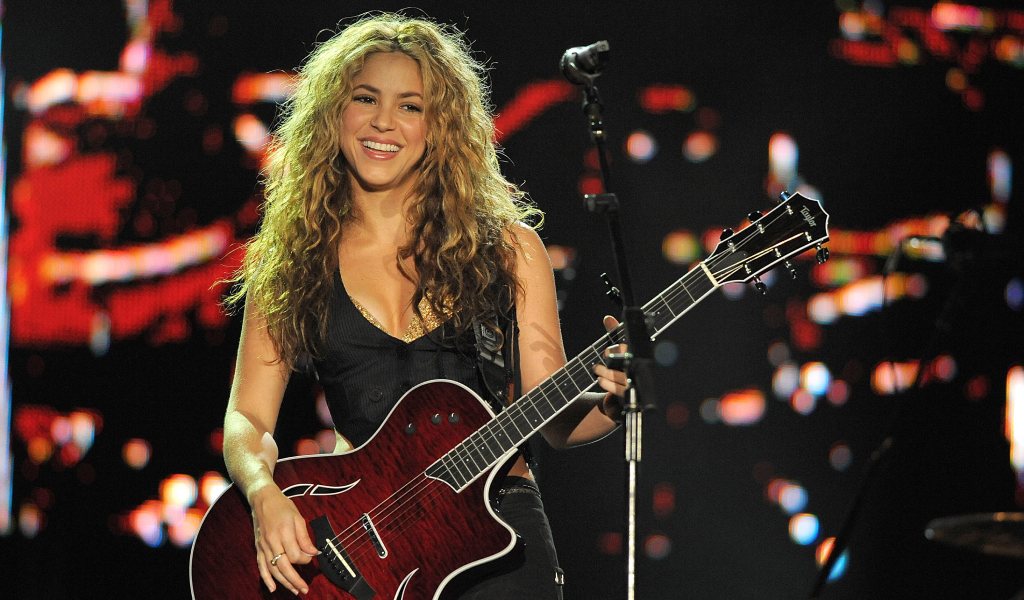Shakira performing live smiling